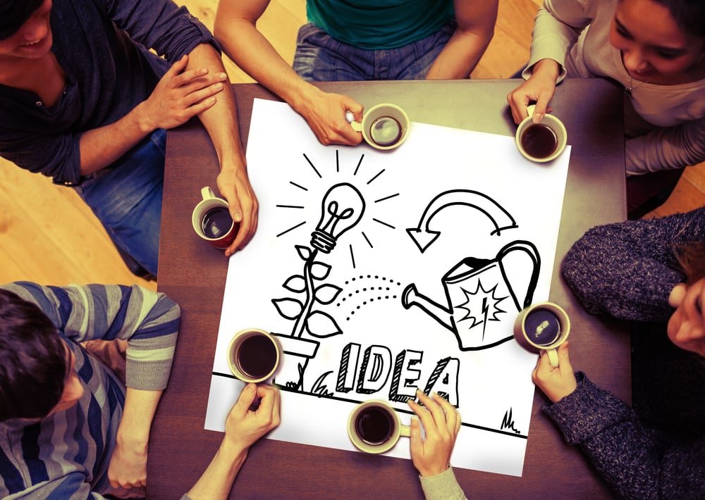 Composite image of idea and innovation graphic on page with people sitting around table drinking coffee Composite image of idea and innovation graphic on page with people sitting around table drinking coffee